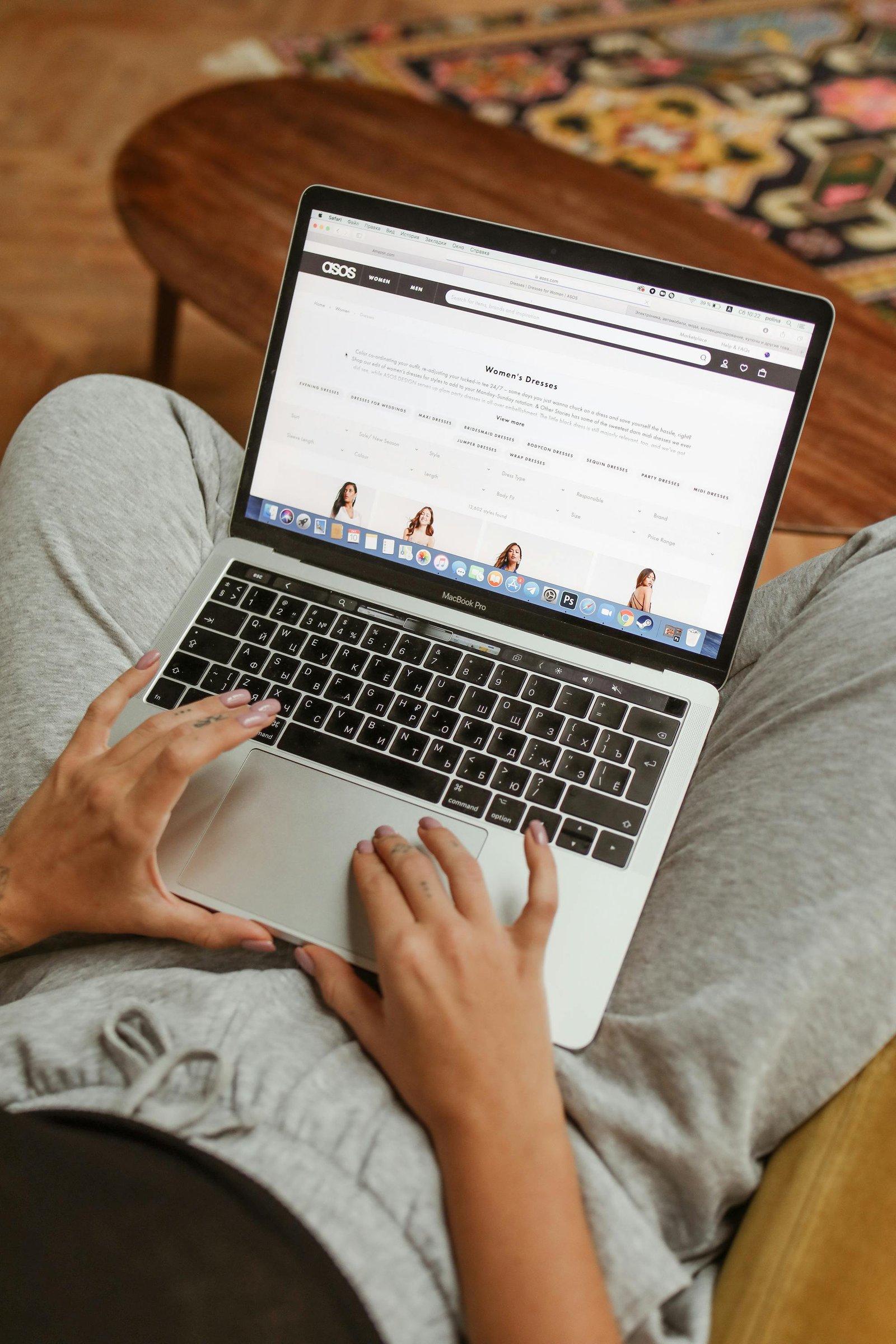 Person browsing a website on a laptop